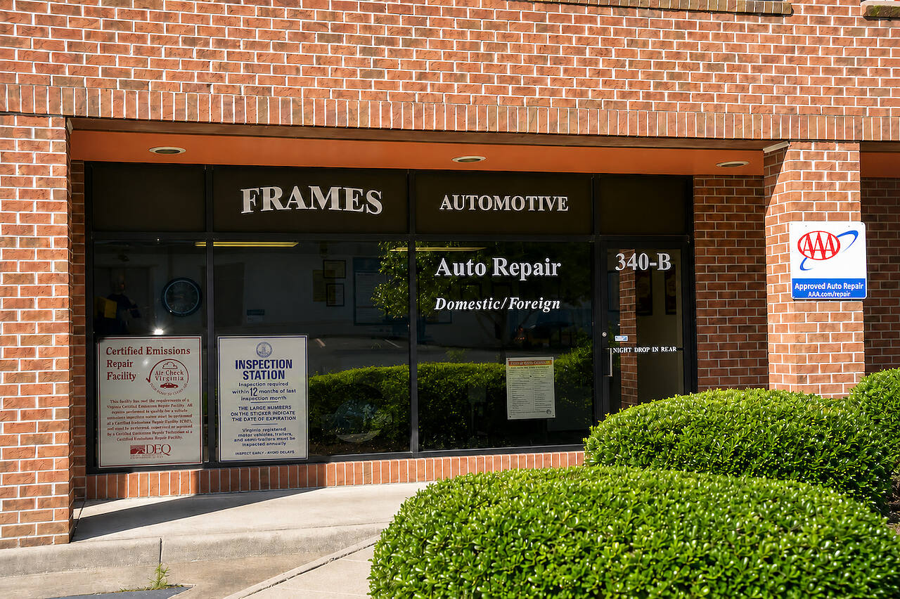 The Frames Automotive storefront at 340-B Mill Street NE, Vienna, with the AAA Approved Auto Repair sign and the Virginia inspection station decal on the window